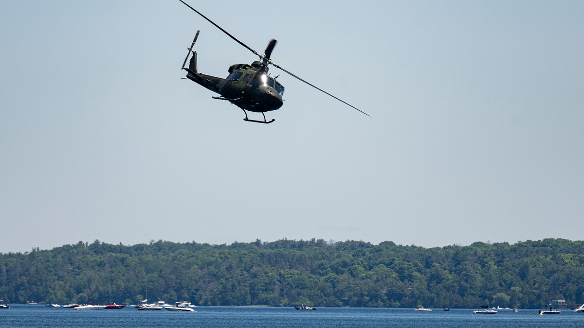 Helicopter flying over Kempenfelt Bay
