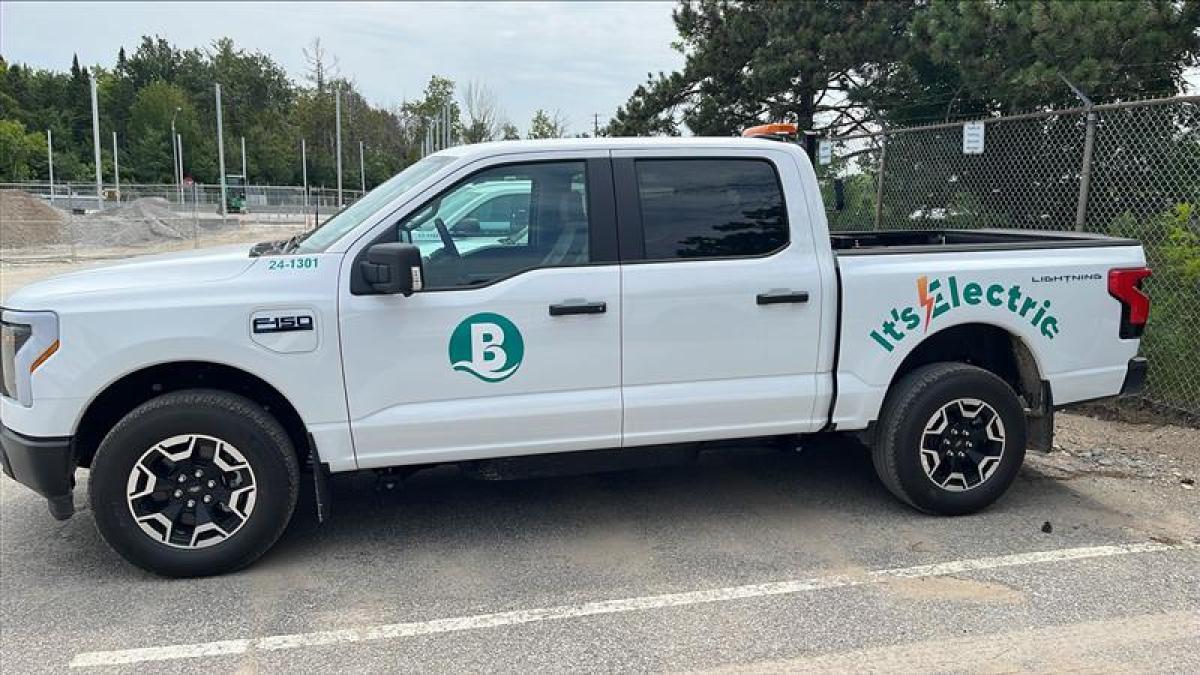 Ford Lightning with decals of the City of Barrie icon and text "It's Electric"