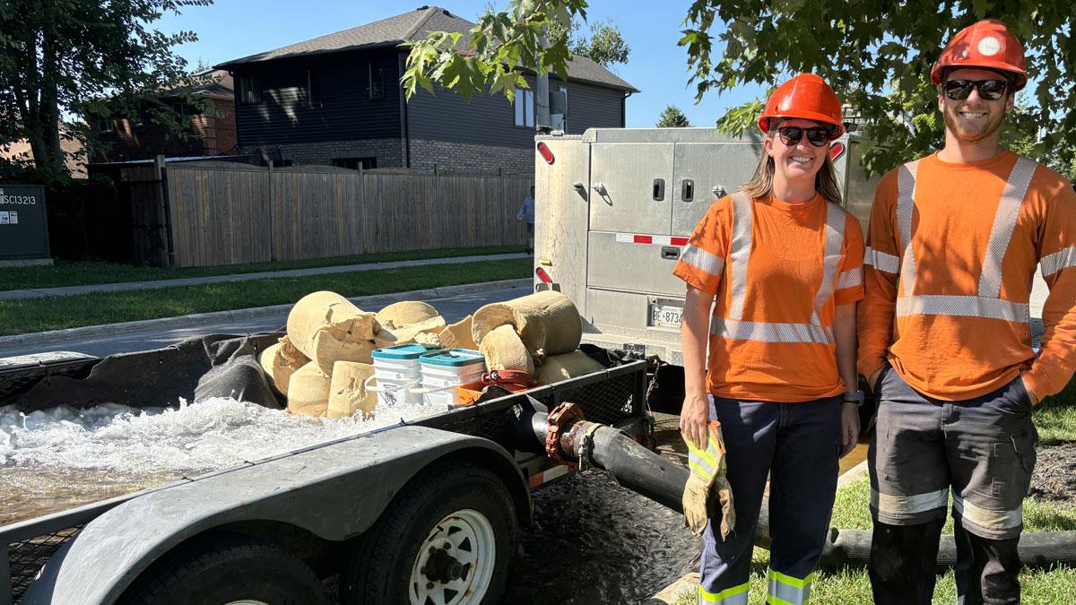 City staff conducting watermain swabbing