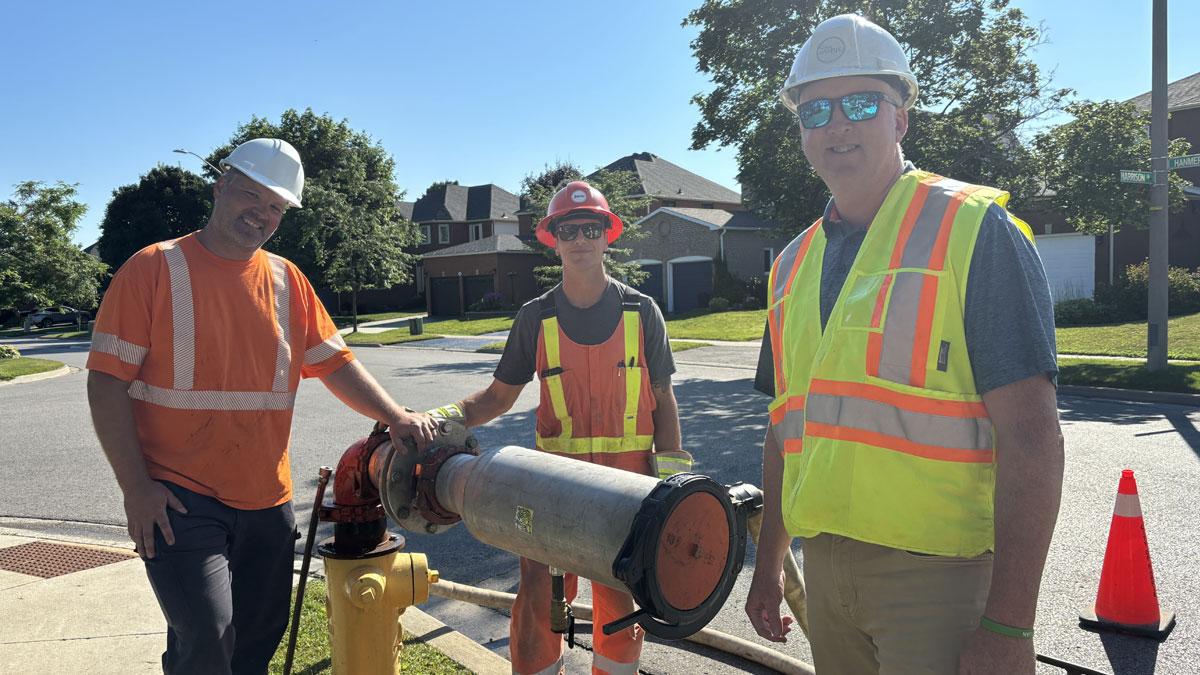 City staff conducting watermain swabbing