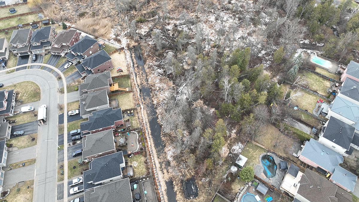 Aerial view of properties and wetland